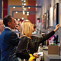People browsing photo books